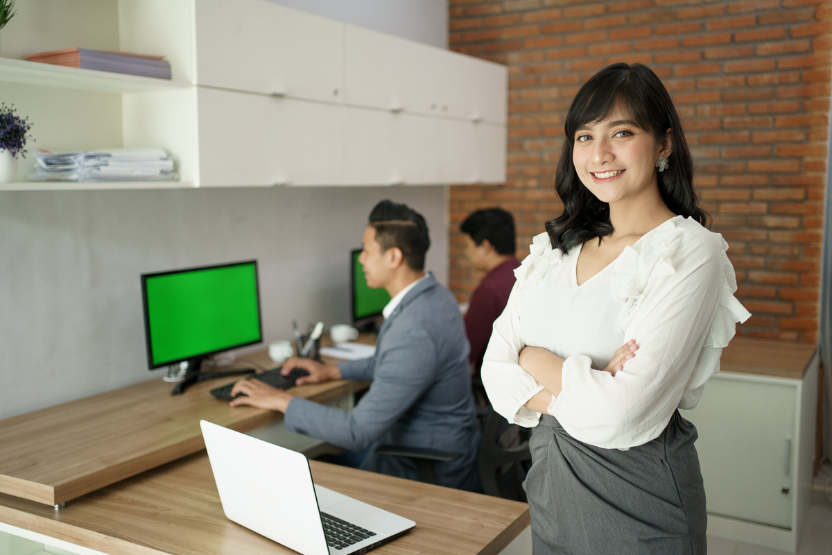 Happy Manager Asian Woman at Office